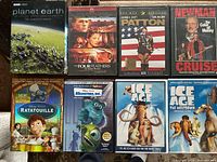 Eight DVD cases laid out; Planet Earth set plus seven movie DVDs
