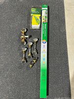 Overview of film roll, application kit and glass doorknobs