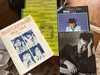 Front covers of all four songbooks