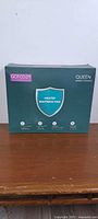 Front of GOT COZY heated mattress pad retail box