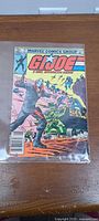 Front cover of G.I. Joe issue 14 in sleeve