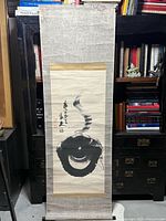 Full view of Japanese hanging scroll on display stand