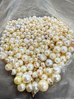 close-up of loose pearls showing size and luster variety
