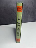 Spine view of book in slipcase showing title, author and publisher