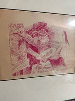 Close-up of red abstract print on paper