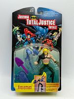 Front view of sealed Aquaman Total Justice blister card figure and accessories