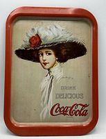 Front of metal serving tray showing Coca-Cola advertisement artwork