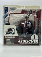 Front of sealed blister pack showing figure and accessories