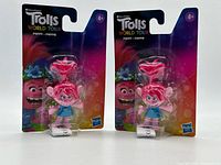 Front view of two sealed Poppy mini figures on cards