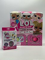 Front view showing LOL Surprise board game and Mini Brands game boxes