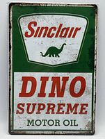 Front view showing Sinclair Dino Supreme Motor Oil graphic and distressed finish
