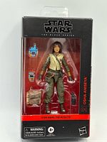 Front view of sealed box showing figure and accessories