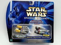 Front view of sealed Podracer Pack 1 showing artwork and two mini Podracers