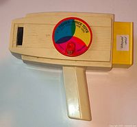 Front view of Fisher-Price movie viewer with cartridge inserted