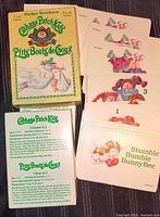 Front of box and spread of Cabbage Patch Kids playing cards