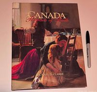 Front cover of the hardcover book with dust jacket and scale marker