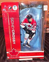 Front view of boxed, autographed Sidney Crosby 12" figure