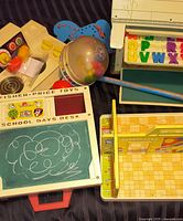 All items in lot including School Days Desk, Play Family School building, popper toy, floor panel and accessories