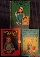 Front covers of the three Raggedy Ann & Andy hardcover books