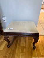 Top view showing upholstered seat and dimensions sticker