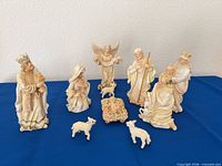 Group view of all resin nativity figures and lambs
