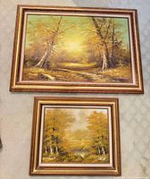 Both framed paintings showing size relationship and matching frames