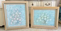 Both framed Sohler floral paintings side by side