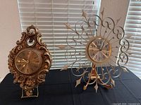 Both clocks side by side showing overall appearance and scale