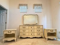 Front view of dresser, mirror, two nightstands