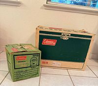 Original boxes for Coleman 56-quart cooler and 1-gallon Sno-Lite jug