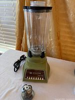 Full view of Waring blender with glass jar and separate blade