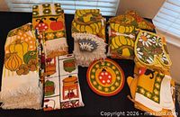 Full group of vintage towels, potholders, oven mitt