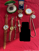 Group shot showing all items on red cloth