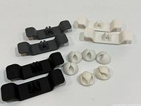 All cable holders arranged by color showing quantity and styles