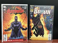 Front view of both bagged Batman issues #701 and #508 side by side