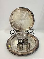 Overall lot showing two trays and four napkin rings