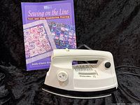 Iron and quilting book together