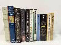 Full row of eleven books, spines outward