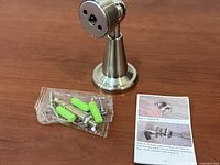 Door stop assembly with screws, anchors, manual