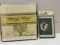 Sealed packs of greeting cards and invitations