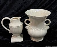 Both ceramic pieces side by side for scale and design overview