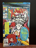 Front of sealed comic showing cover art and bonus card notice