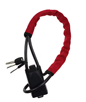 Steering wheel lock coiled showing red sleeve, lock body and two keys
