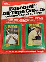 Front view of sealed card set showing Aaron and Mantle cards and packaging title