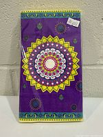 front view of sealed pack showing mandala design