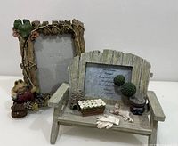 Both garden-themed photo frames front view