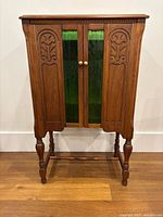 Front view of wooden cabinet closed