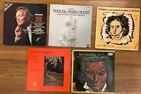 Front view of five LP record sleeves