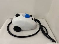 Dupray steam cleaner side view with hose attached