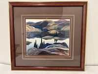 Front view of framed Lawren Harris landscape print showing artwork, matting and frame
